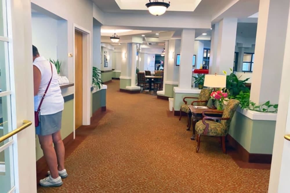 Well lit hallway at The Iris Senior Living in Great Falls, Montana. 