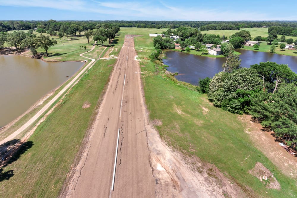 Aerial view of the pathway beside the lake at Canton Lakeside Village in Canton, Texas