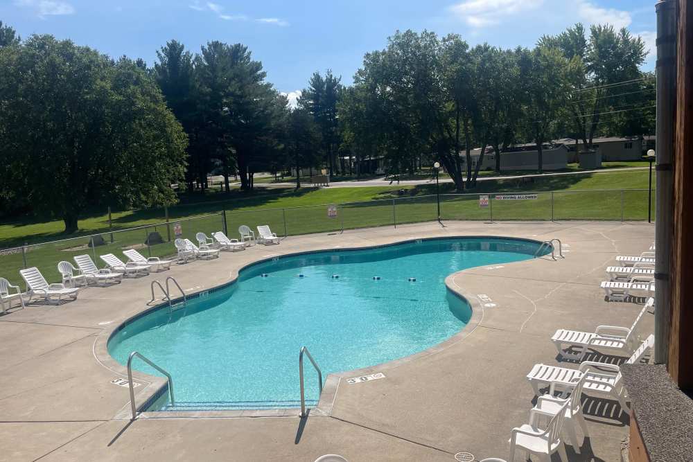 Swimming pool with lounge beds at Deer Run Estates in Baraboo, Wisconsin, 