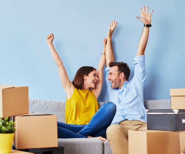 A young couple happy about Handy Storage in Miami, Florida