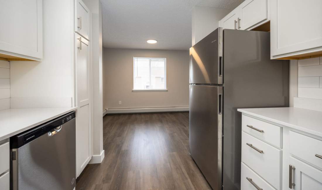 Open kitchen and living area at Poplar Gardens in Rochester, New York