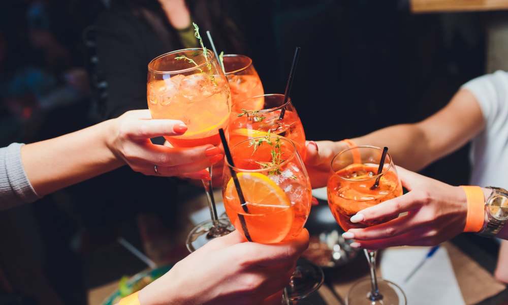 Residents celebrating with drinks near Creekside Park Apartments in Napa, California