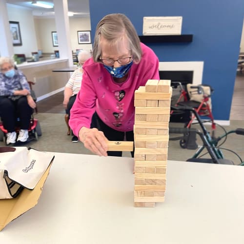 Residents playing Jenga at Madison House in Norfolk, Nebraska