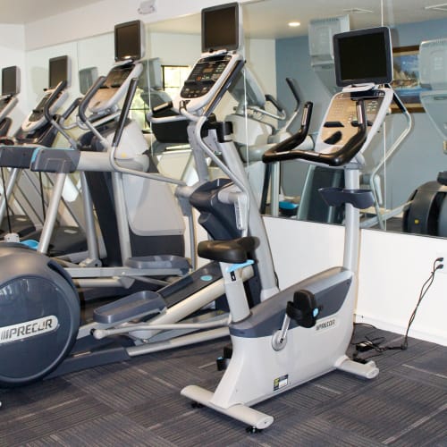 Exercise equipment in the fitness center at Howard Gilmore Terrace in La Mesa, California