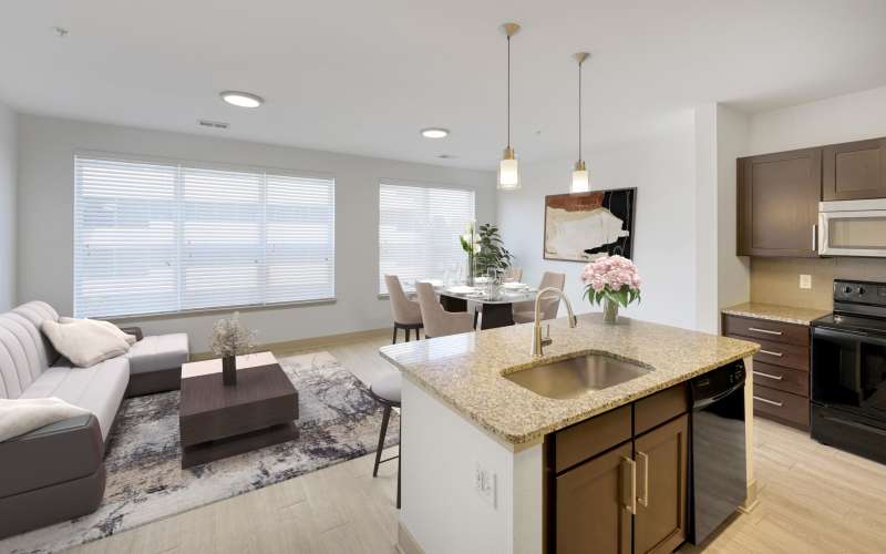 The dining room, living room with large windows at Helios in Englewood, Colorado