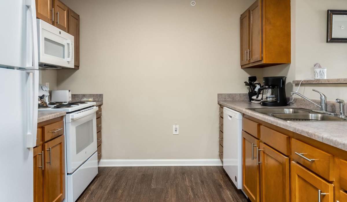 Modern Kitchen with wooden cabinets and appliances at Labelle Greene IV in Wheeling, West Virginia