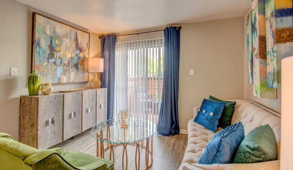 Living area with updated interiors at University Green Apartments in Houston, Texas