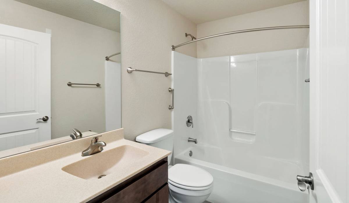 Modern bathroom at Lemon Bay Apartments in Englewood, Florida