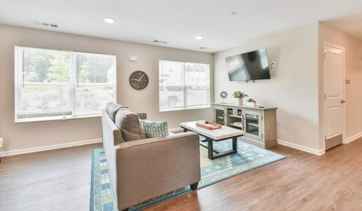 Spacious living room with couch at Canaan Crossing in Madison, Georgia