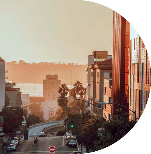 City view with traffic near Flora + Fauna in San Diego, California