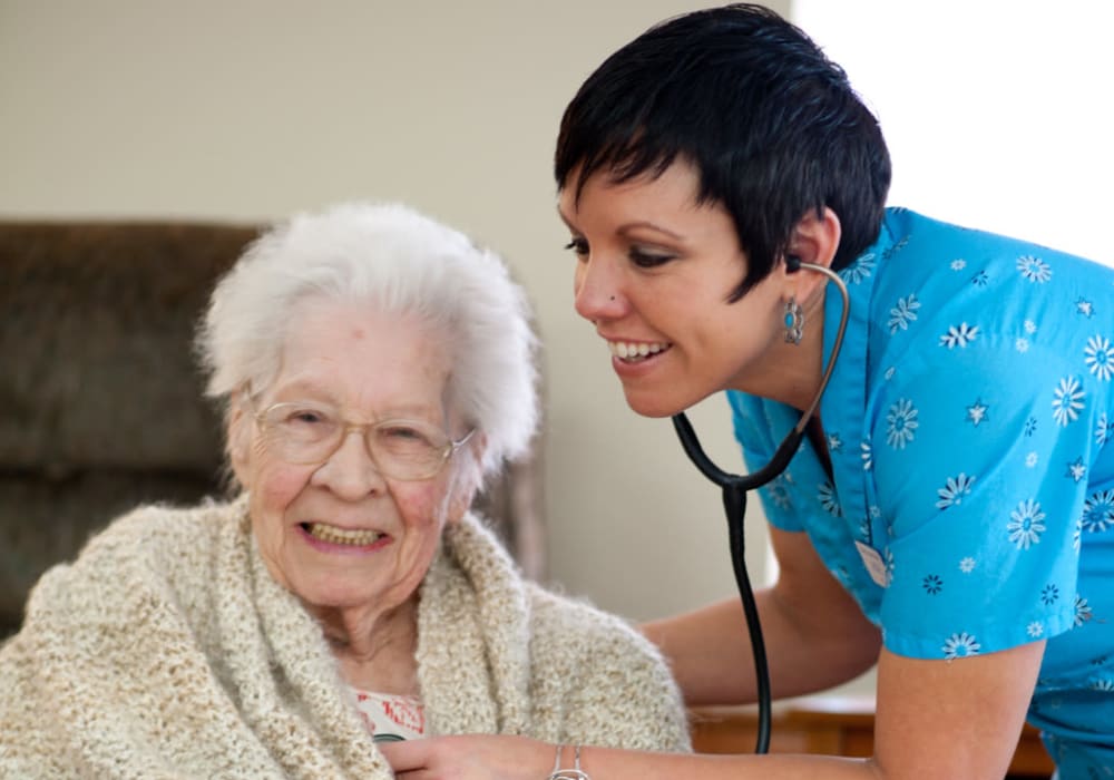 Resident receiving a check up at Geneva Lake Manor in Lake Geneva, Wisconsin