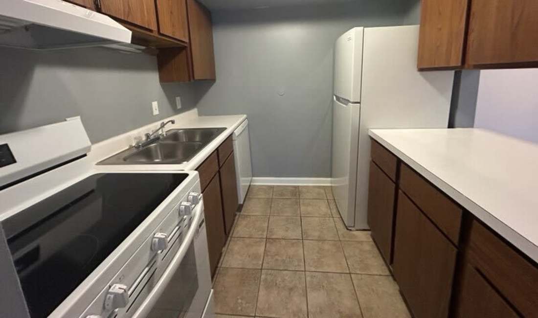 Kitchen with refrigerator at Brookside Commons in Meadville, Pennsylvania