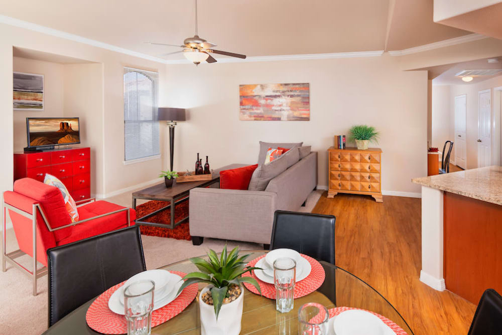 Kitchen with stainless steel appliances and view of living room at Villas on Hampton Avenue