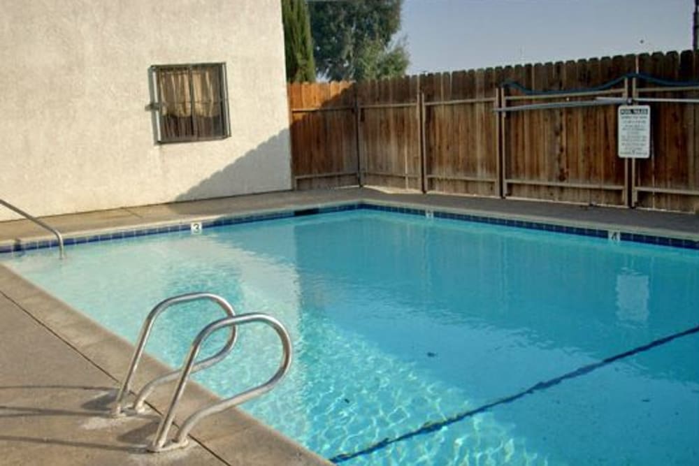 The spacious swimming pool at El Potrero Apartments in Bakersfield, California