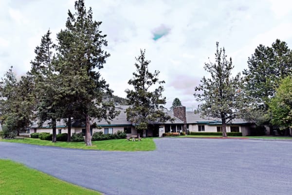 Rehabilitation care facility with a beautiful front entrance at Pilot Butte Rehabilitation Center in Bend, Oregon