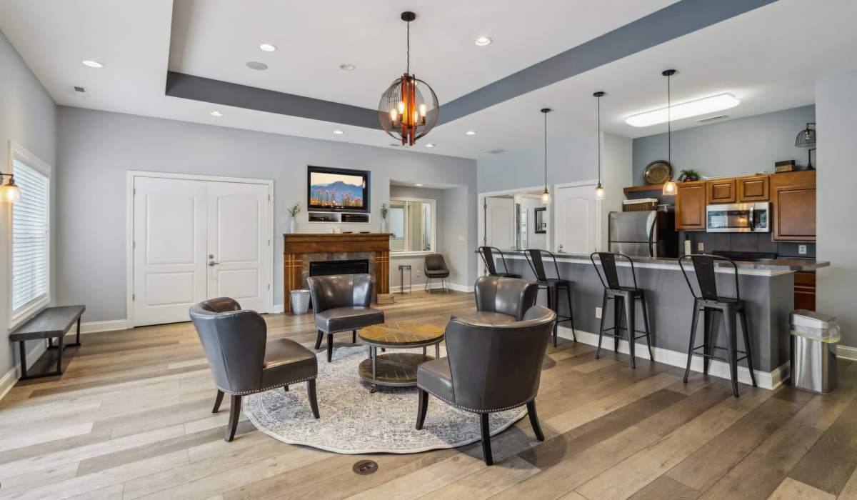 Living room with gray colored furniture at Bluestone in Greenfield,Indiana