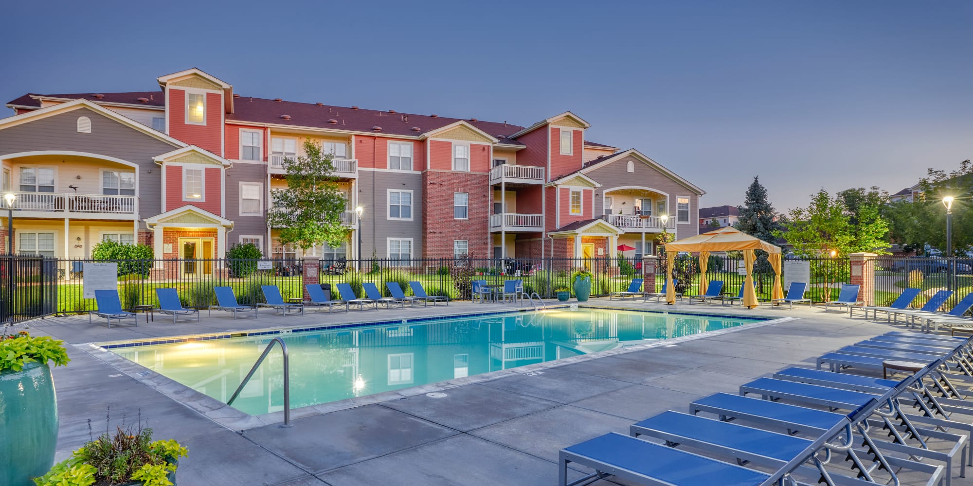 poolside view with lounges and cabanas at Bear Valley Park in Denver, Colorado