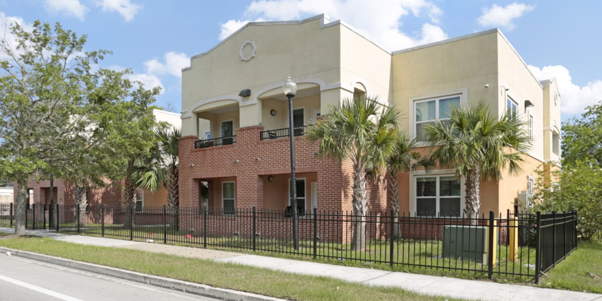 Exterior view of apartments at Dozier Apartments in Jacksonville, Florida