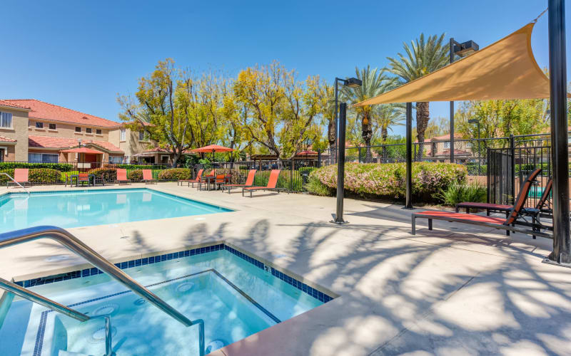 Spa and swimming pool at Tuscany Village Apartments in Ontario, California