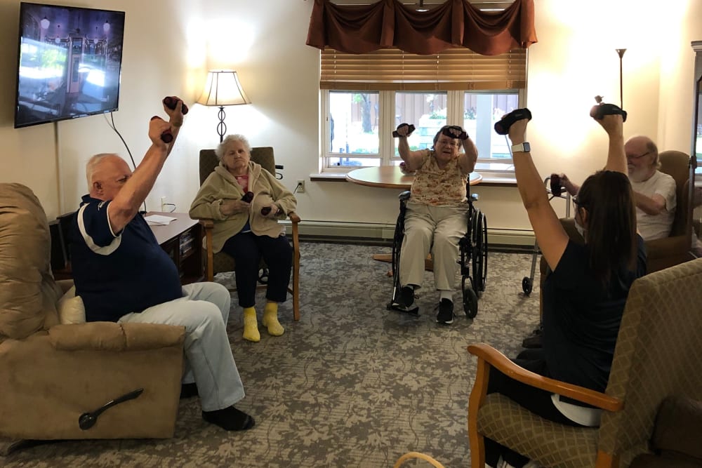 Residents participate in strength training exercises at Landings of Sauk Rapids in Sauk Rapids, Minnesota