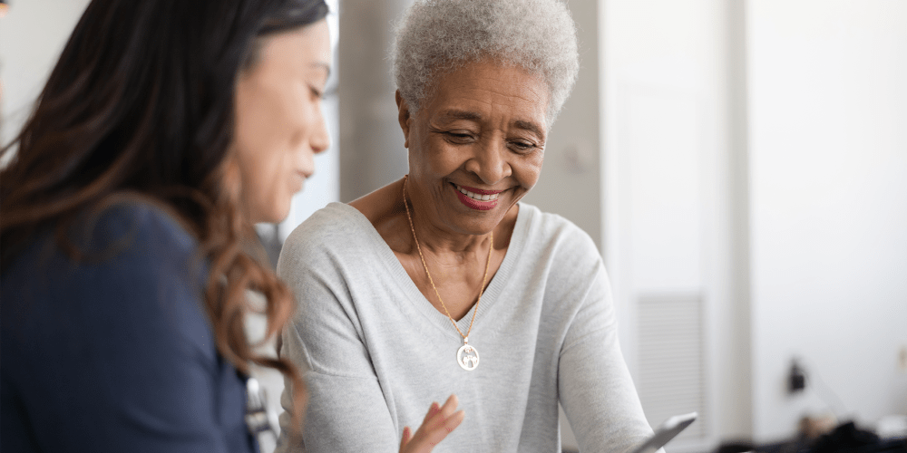 Resident being assisted at Leisure Living Communities for Seniors