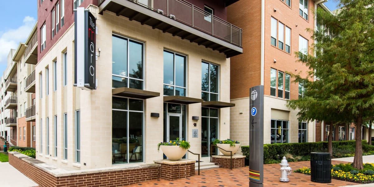 Street view of the entrance to The Marq on West 7th in Fort Worth, Texas