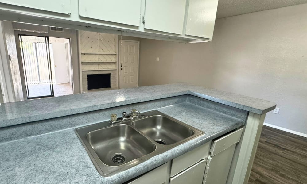 A kitchen sink at Santa Fe Apartments in Dallas, Texas