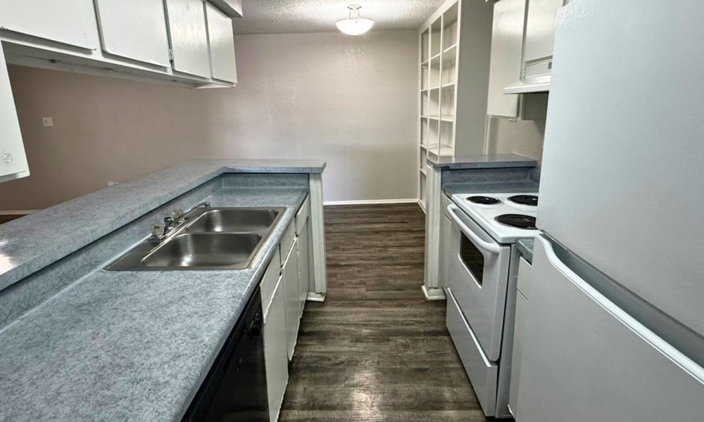 Kitchen with good lighting at Santa Fe Apartments in Dallas, Texas