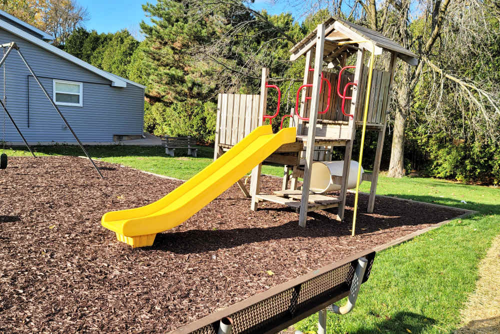 Playground with a slide at Taylor Crossing in Green Bay, Wisconsin