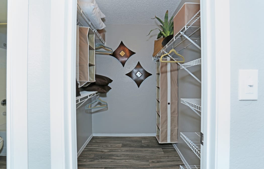 Walk-in closet in a model home at Solis at Flamingo in Las Vegas, Nevada