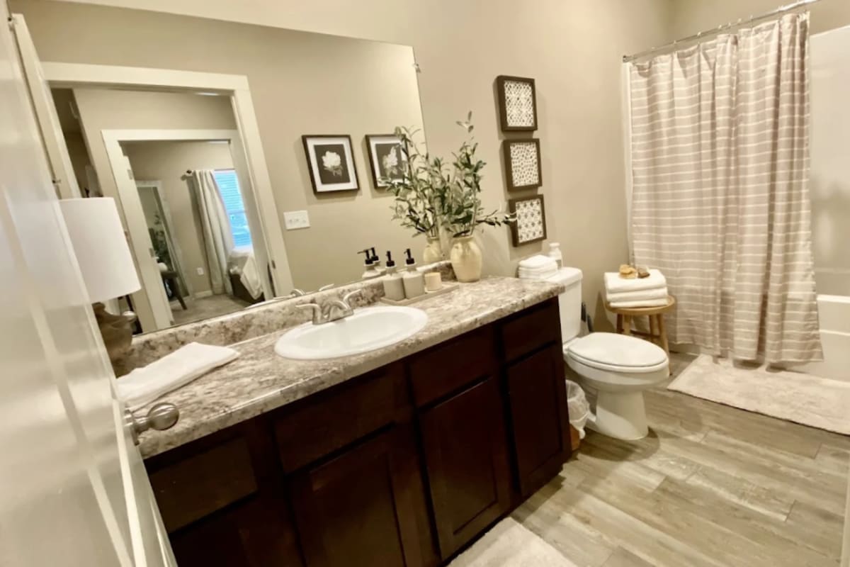 Bathroom with tub at Atlas at Cabot in Cabot. AR