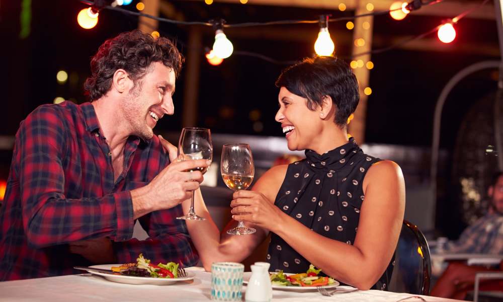 Residents having dinner at restaurant near Avonlea On The River in Duluth, Georgia