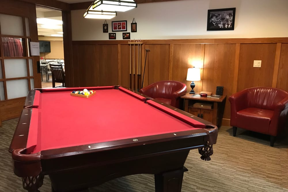 Activity room with pool table at Prairie Hills Cedar Rapids in Cedar Rapids, Iowa. 