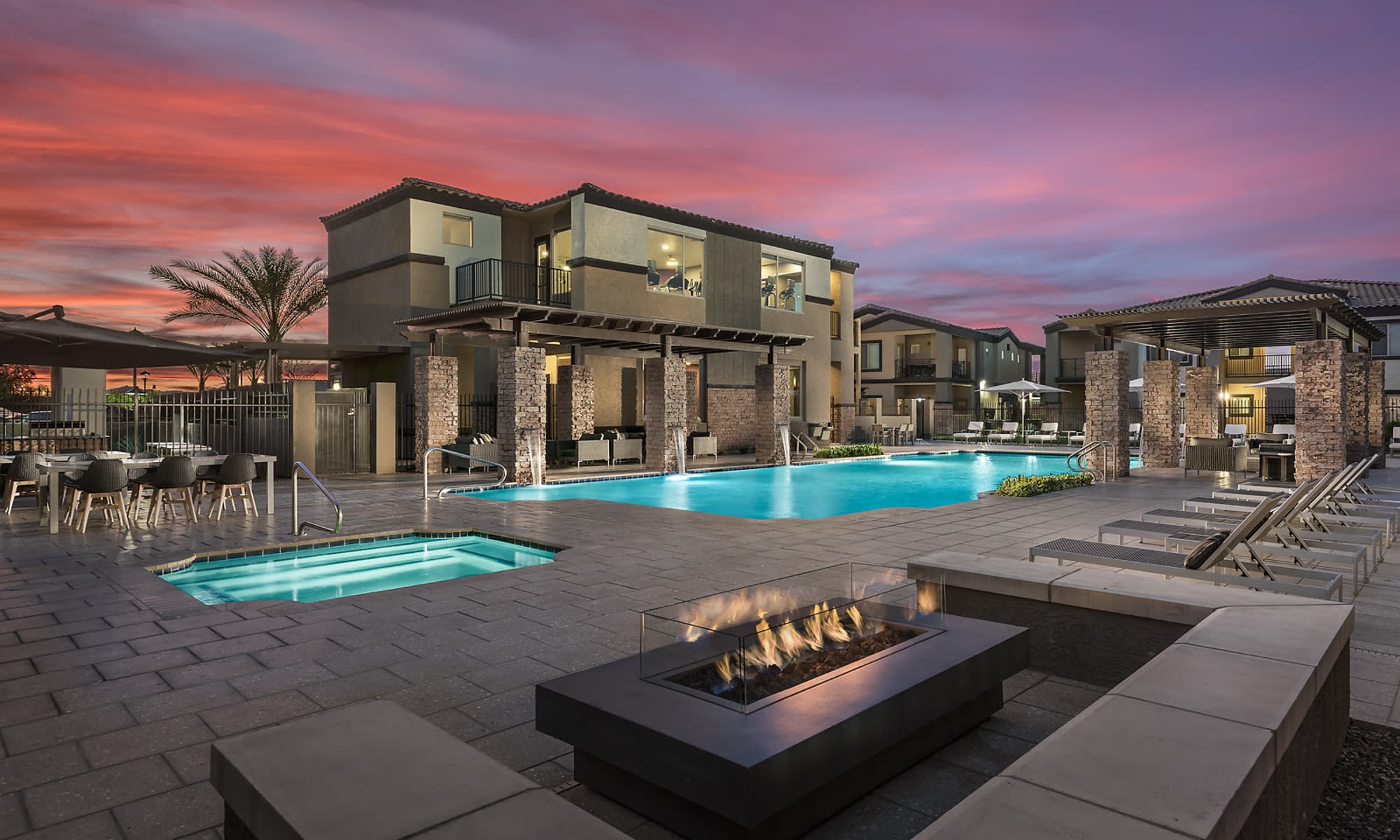 Swimming pool  and lounge area at The Maxx 159 in Goodyear, Arizona