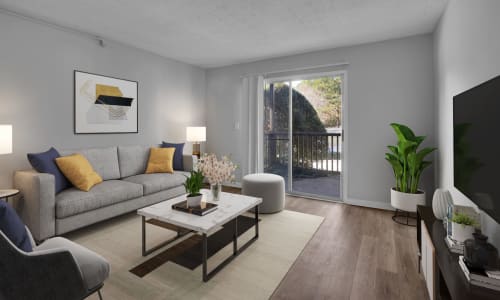 Hardwood flooring and furniture in a model apartment living room at Silver Creek Crossing in Austell, Georgia