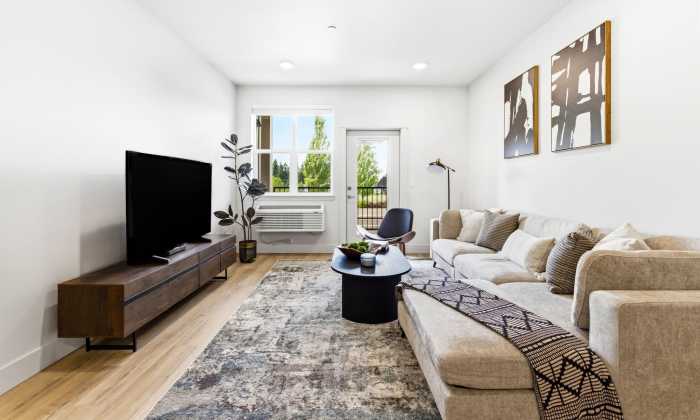 View of the living room at The Heights at Happy Valley in Happy Valley, Oregon