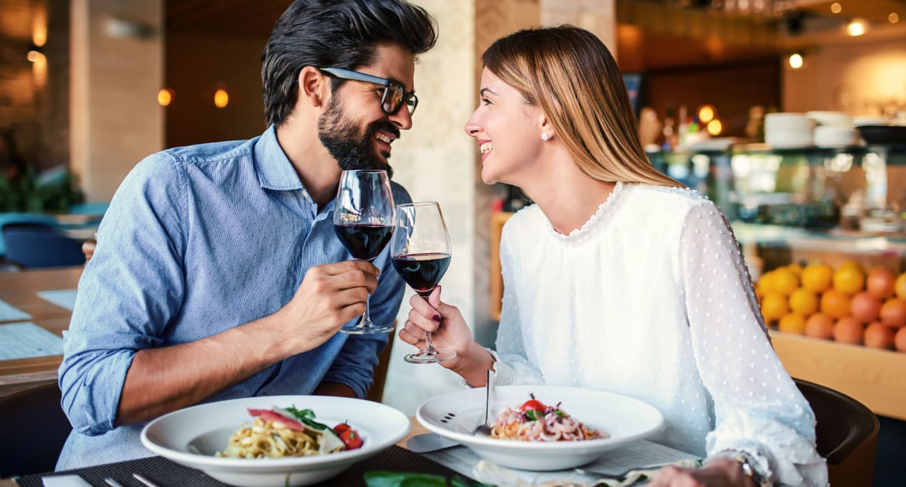 Couple enjoying dinner and wine together near 140 Prospect in Hackensack, New Jersey