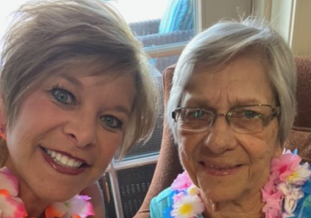Residents with flower necklaces at Truewood by Merrill, Keller in Keller, Texas