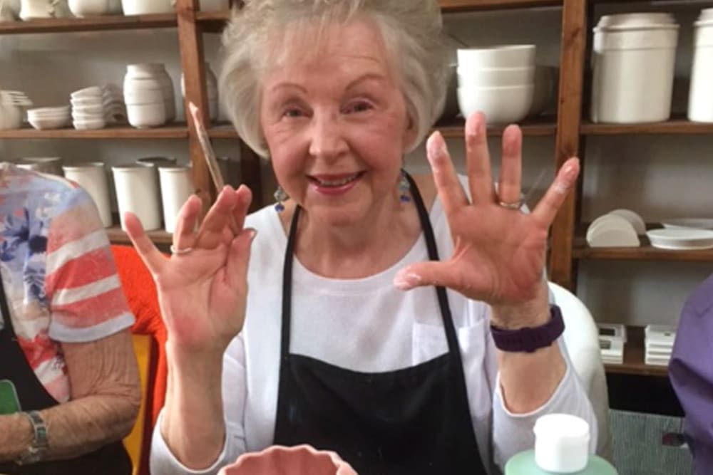 Resident doing some crafts at Hilltop Commons Senior Living in Grass Valley, California