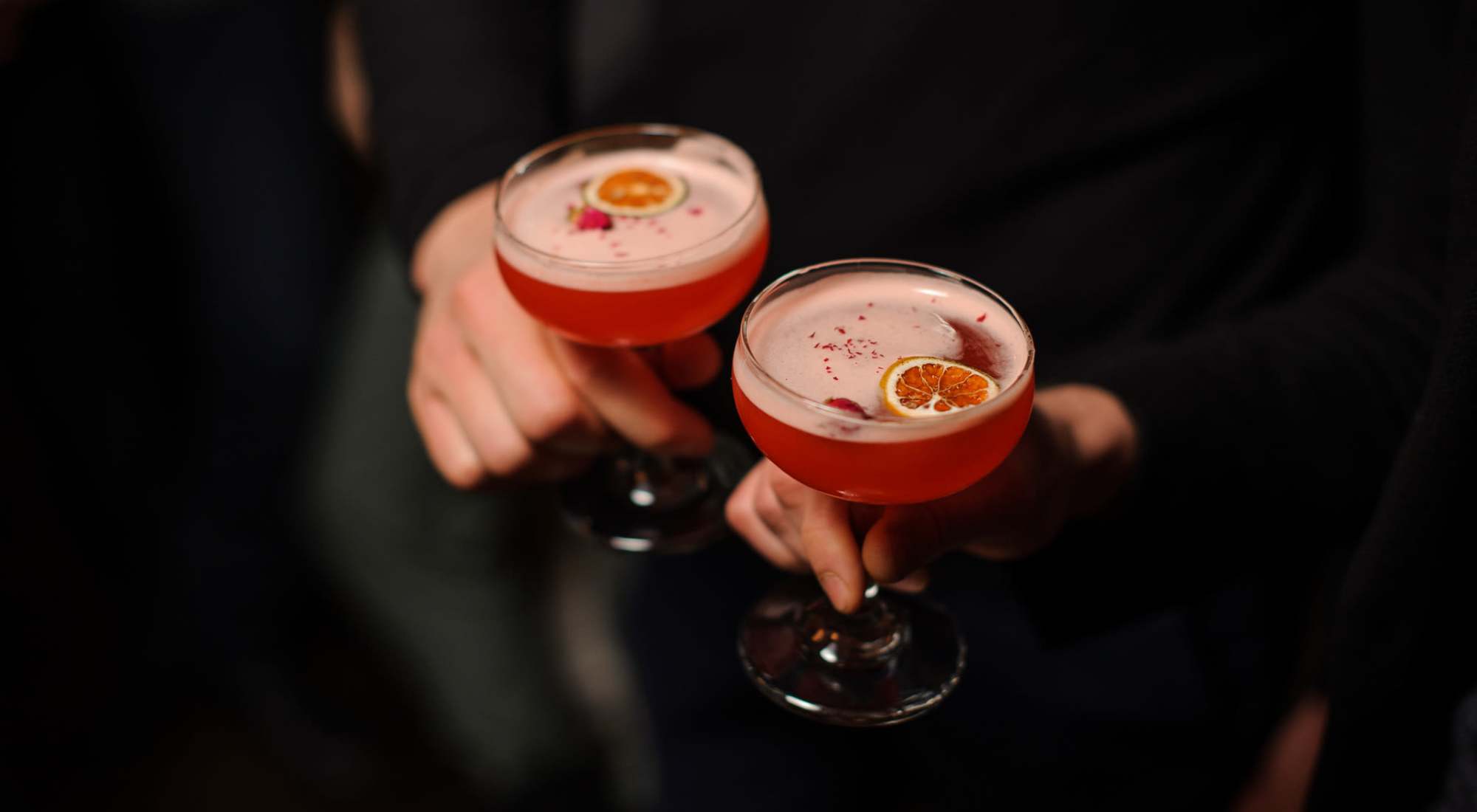 Two colorful cocktails at a restaurant near The Colton in Redwood City, California