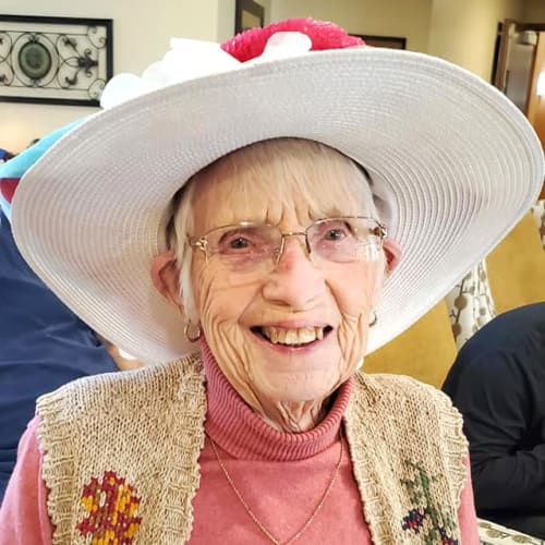 A smiling resident at The Oxford Grand Assisted Living & Memory Care in Kansas City, Missouri