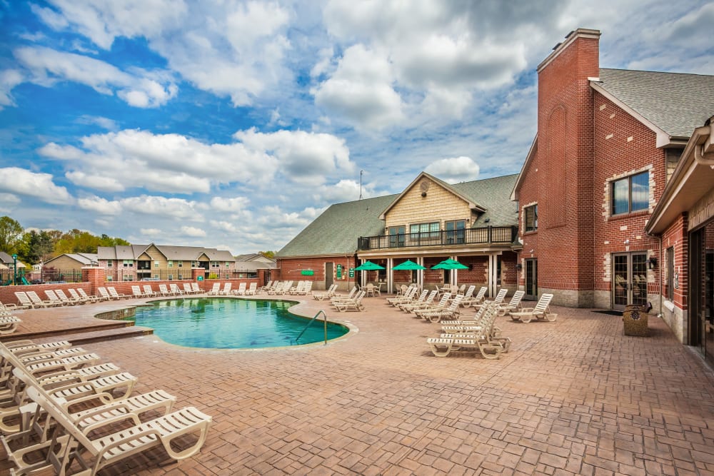 Swimming pool and expansive deck with lounge seating at Cobblestone Crossings in Terre Haute, Indiana