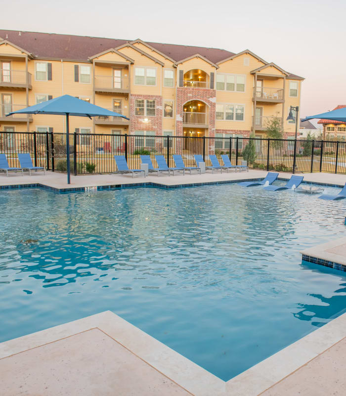 Large swimming pool at Portico at Friars Creek Apartments in Temple, Texas