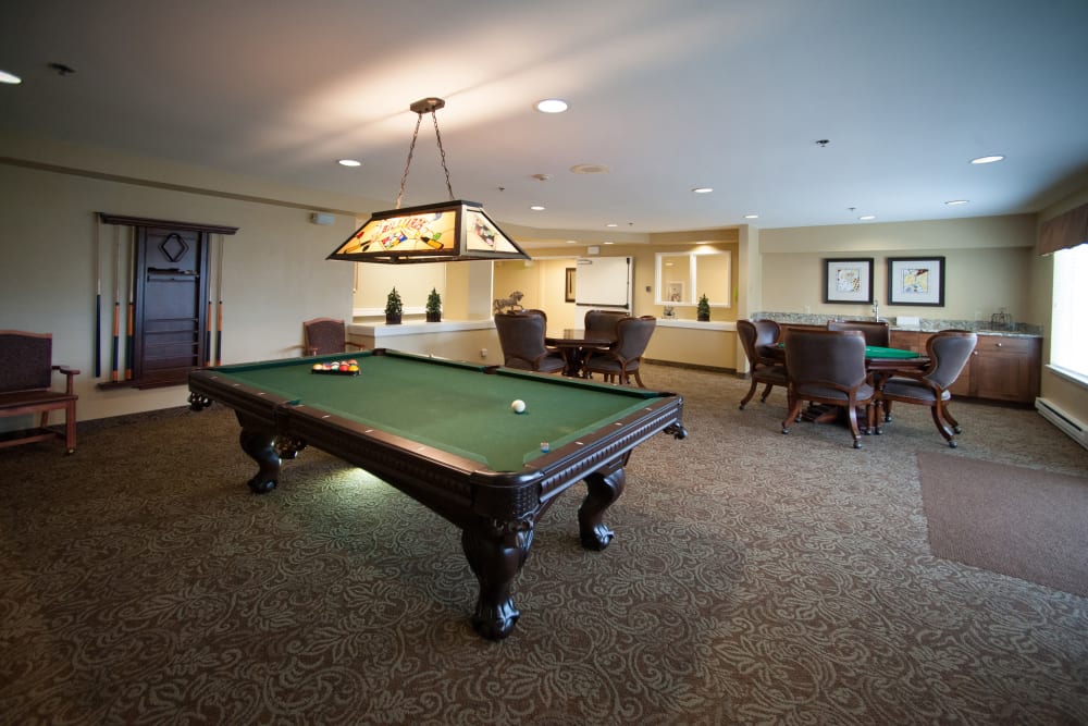 A pool table in the game room at The Ridge at Oregon City in Oregon City, Oregon