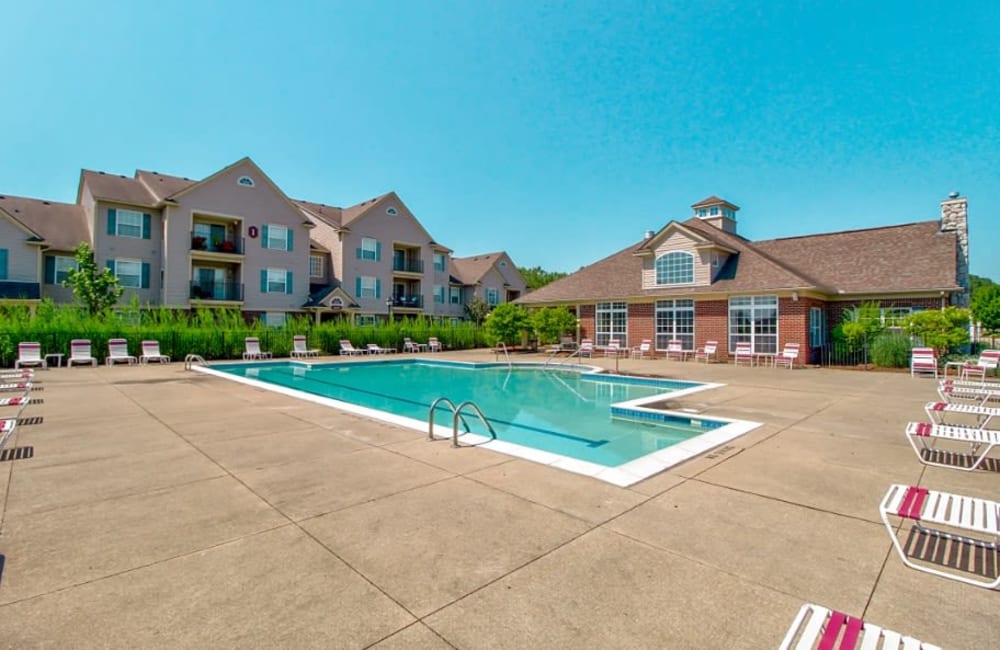 Sparkling pool with sun deck at Stratford Place at Brownstown in Brownstown, Michigan