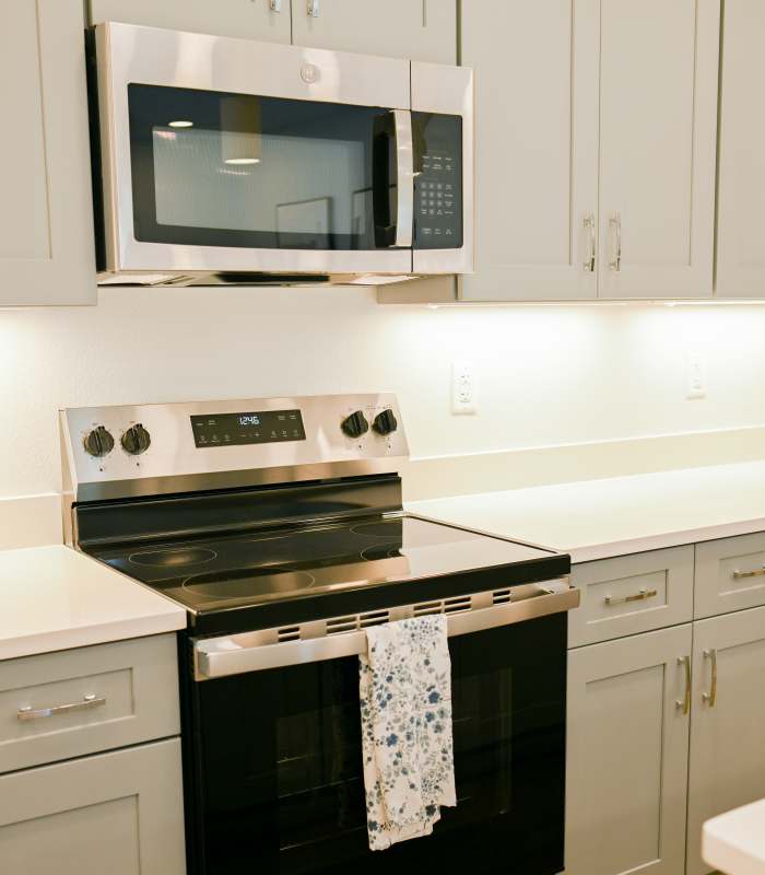 Stainless-steel appliances in kitchen at Anchor Apartments in Freeport, Florida