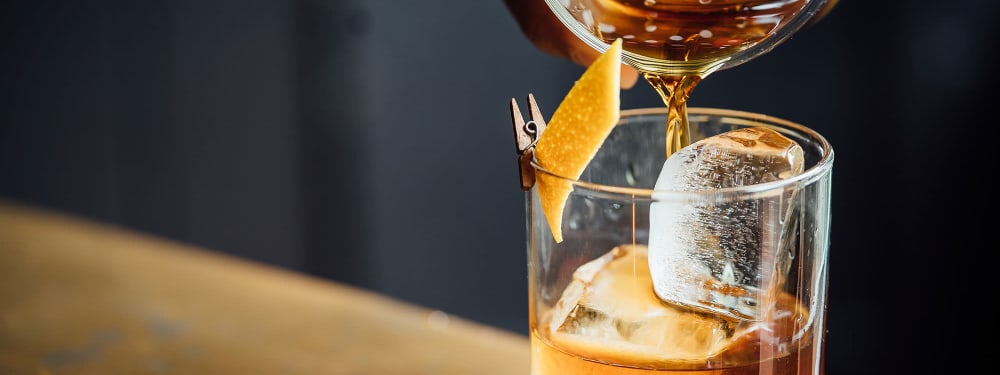 A drink being poured in an apartment at The Columbia at the Waterfront in Vancouver, Washington