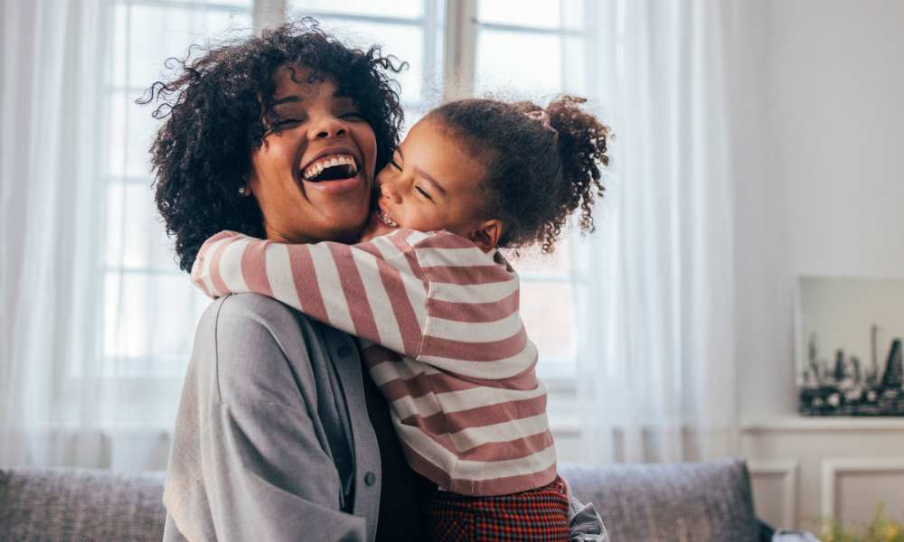 Mother and daughter in their new apartment at Avonlea Westside in Atlanta, Georgia