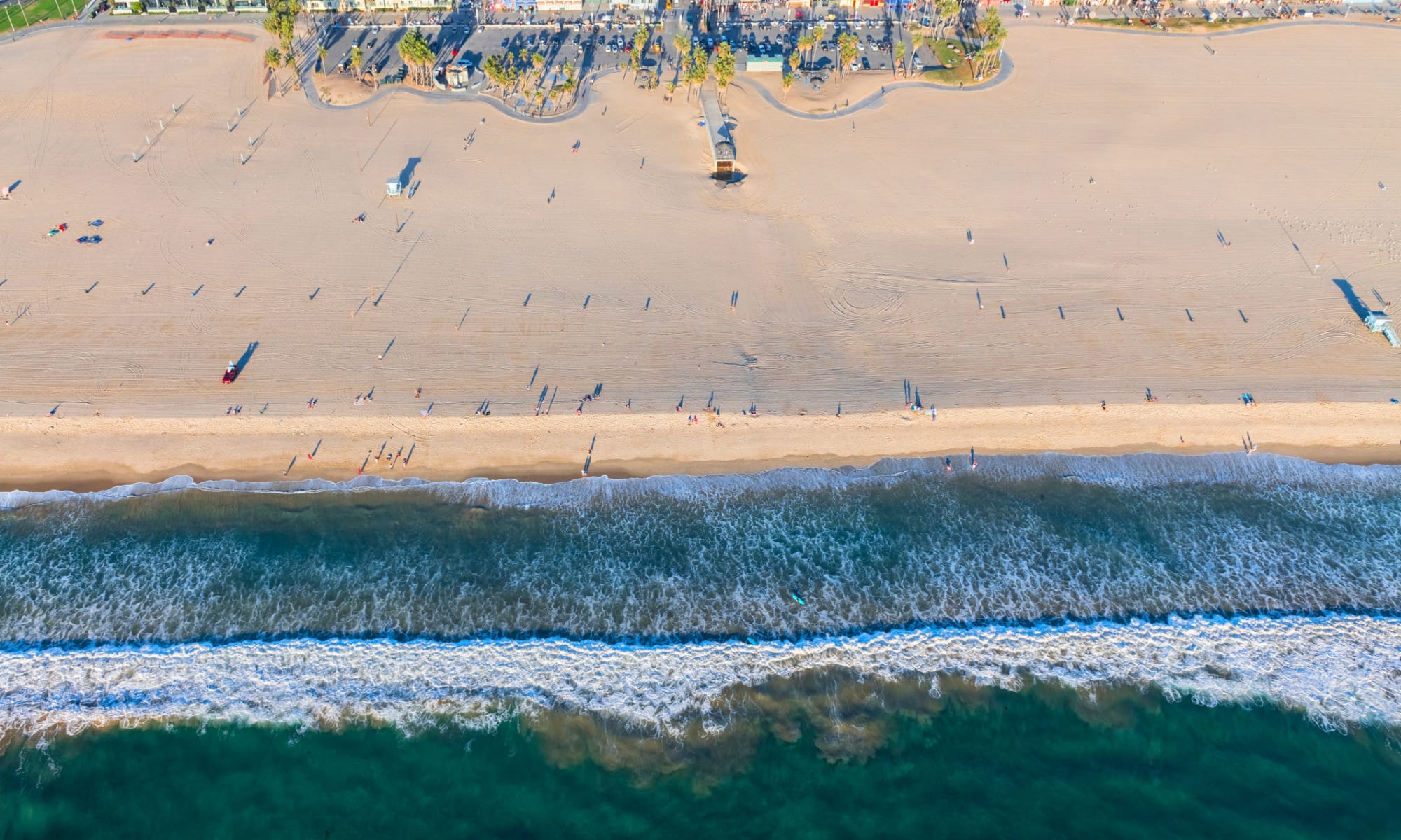 Aerial view of the beach and shoreline near The Meadows in Culver City, California