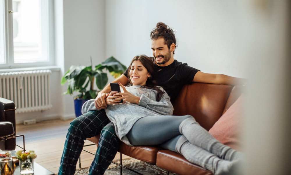 Couple in living room at Chateau Hills in Portland, Oregon